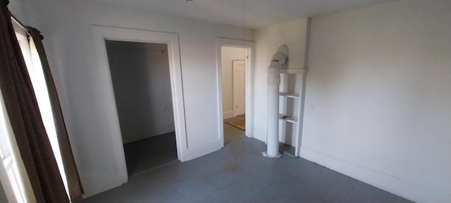 unfurnished bedroom with a closet