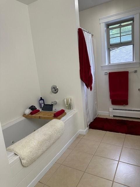 bathroom with tile patterned flooring, walk in shower, and a baseboard heating unit