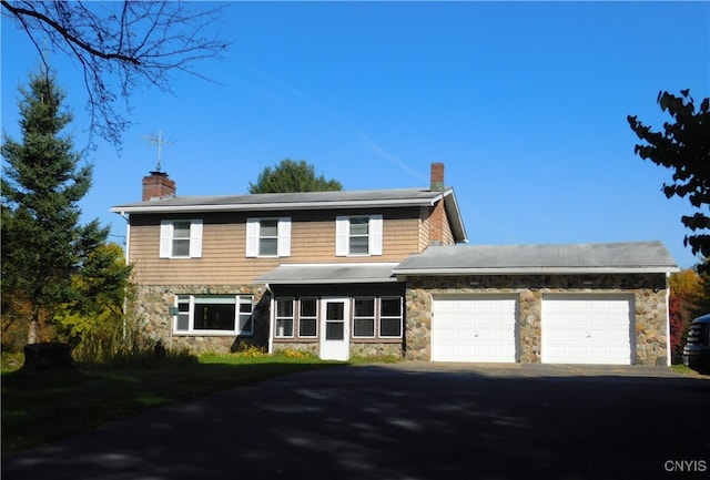 view of front of property featuring a garage