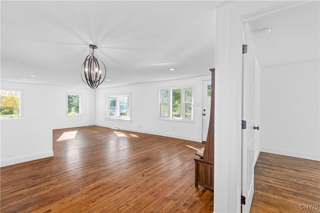 9869 Hazard Rd, Marcy, NY 13403 - spare room with baseboards, wood finished floors, a chandelier, recessed lighting, and a smoke detector