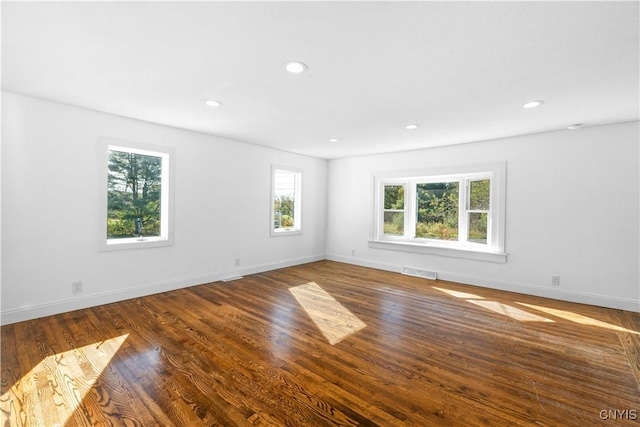 9869 Hazard Rd, Marcy, NY 13403 - unfurnished room featuring baseboards, recessed lighting, and wood finished floors