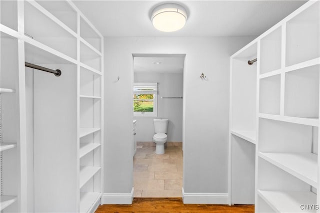 9869 Hazard Rd, Marcy, NY 13403 - bathroom with toilet and baseboards