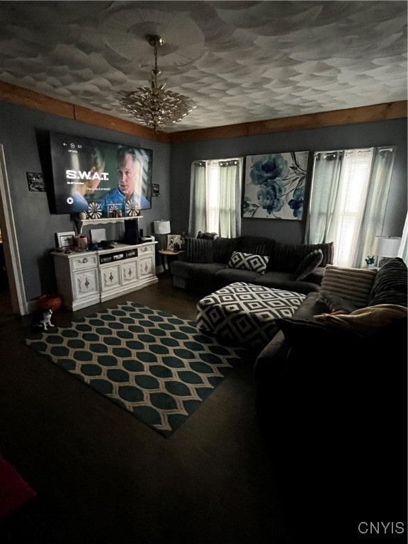 cinema room featuring a notable chandelier