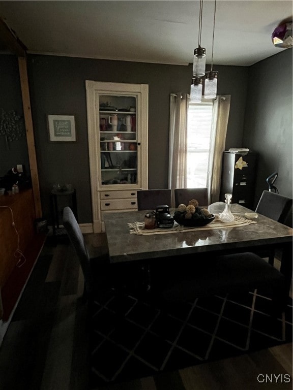 dining area with hardwood / wood-style floors