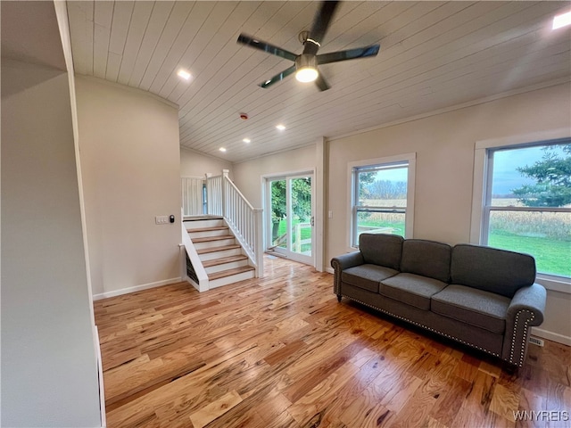 living room with light hardwood / wood-style flooring, lofted ceiling, wood ceiling, and ceiling fan