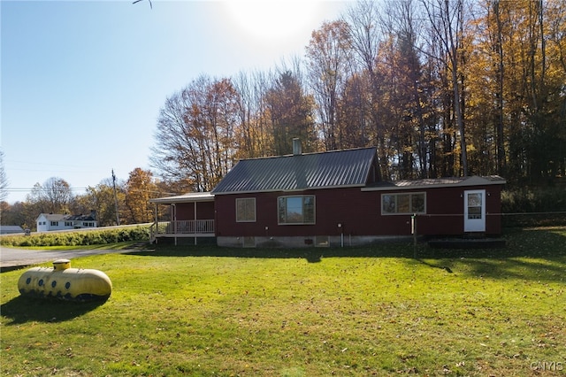 exterior space with a yard