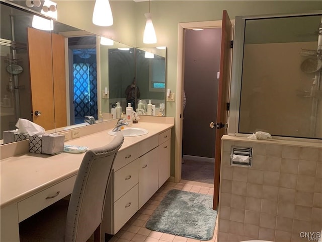 bathroom with vanity and tile patterned floors