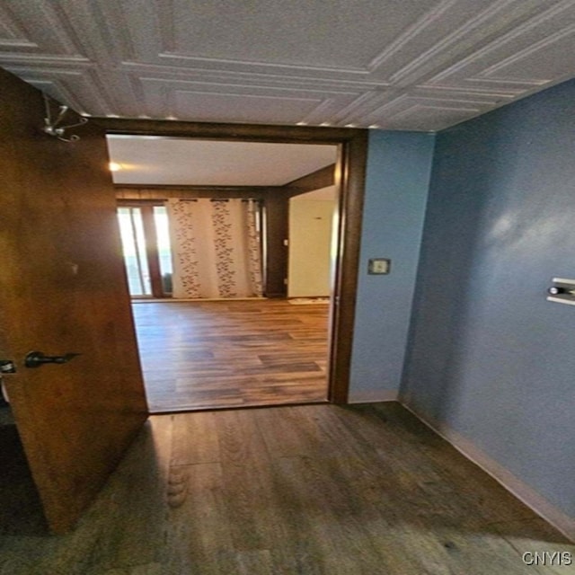 unfurnished room featuring hardwood / wood-style flooring