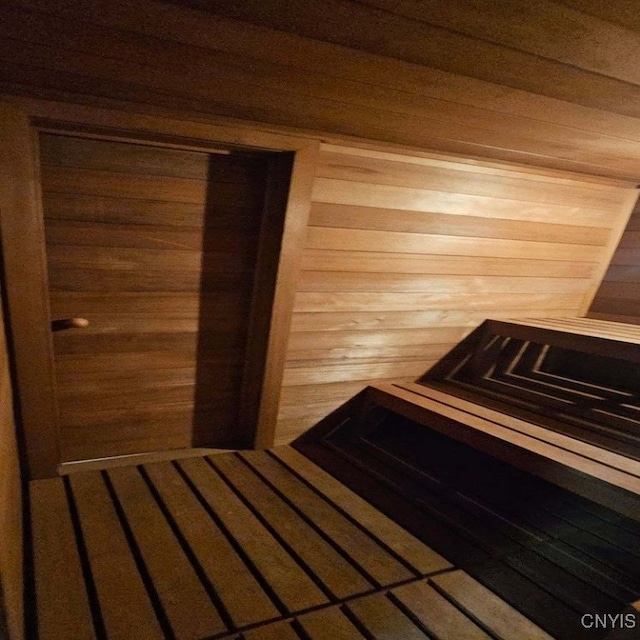 view of sauna / steam room featuring wood walls