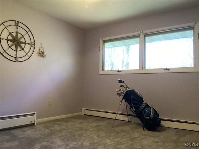 misc room with carpet floors and a baseboard radiator