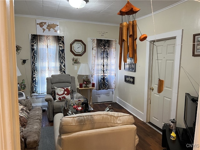 living room featuring ornamental molding and dark wood-type flooring