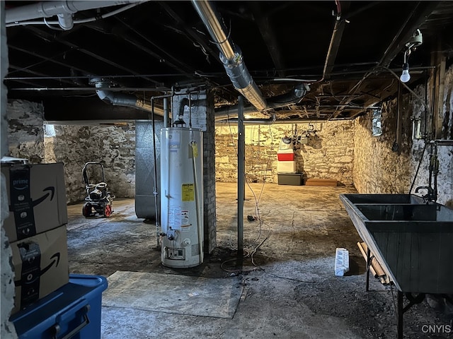 basement with sink and gas water heater