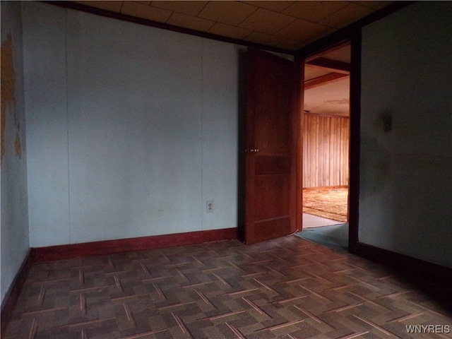 empty room with dark parquet floors