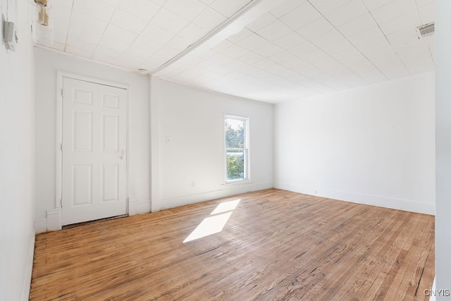 empty room featuring hardwood / wood-style floors