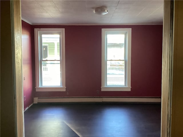 empty room featuring dark hardwood / wood-style flooring