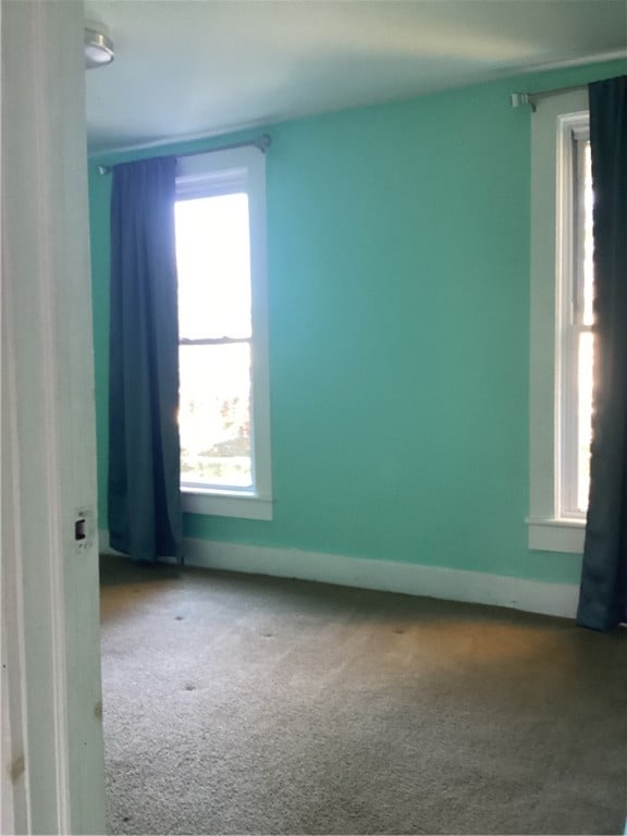 view of carpeted spare room