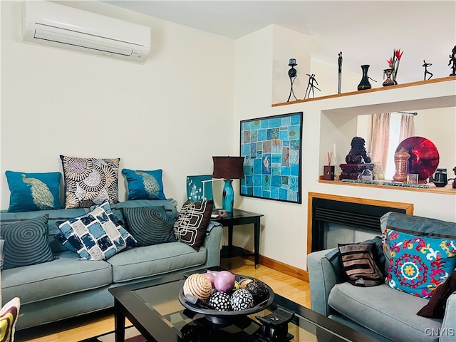 living room with wood-type flooring and a wall mounted air conditioner