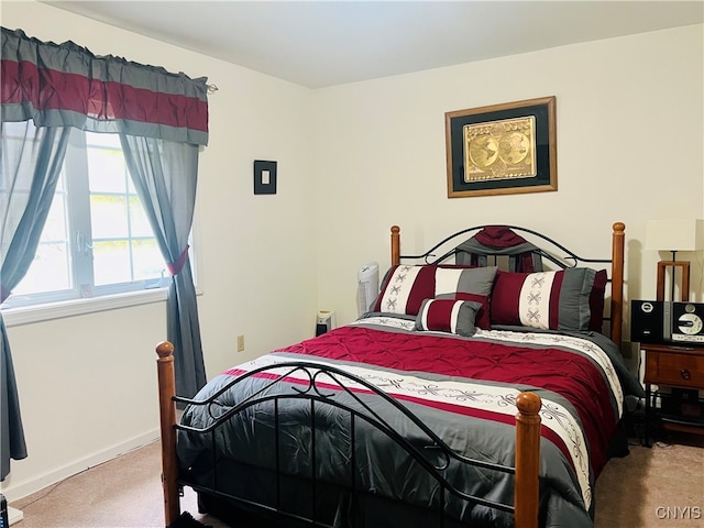 bedroom featuring carpet