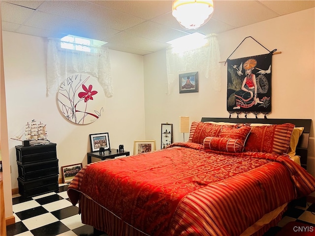 bedroom featuring a drop ceiling