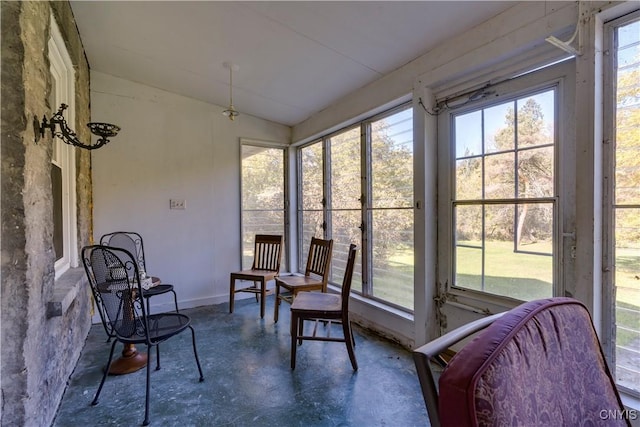 sunroom / solarium with vaulted ceiling