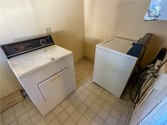 washroom featuring washer and dryer