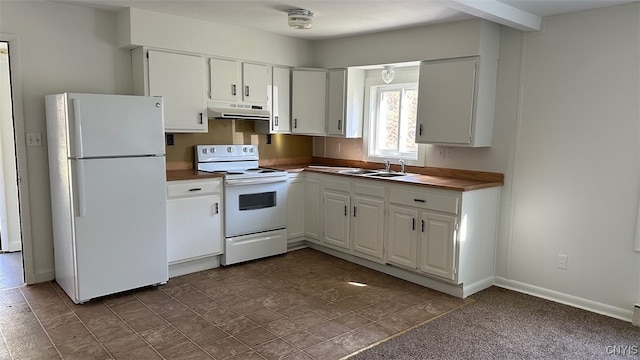 kitchen with white cabinets, carpet floors, sink, and white appliances