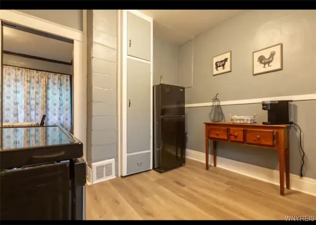 miscellaneous room with light hardwood / wood-style floors