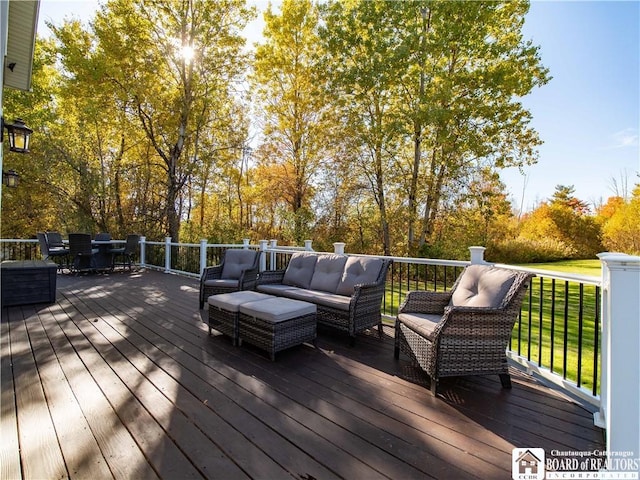 wooden deck with an outdoor hangout area