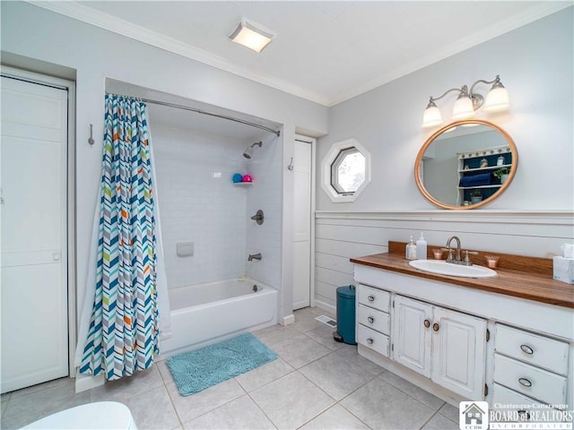 full bath with tile patterned floors, shower / bathtub combination with curtain, vanity, and ornamental molding