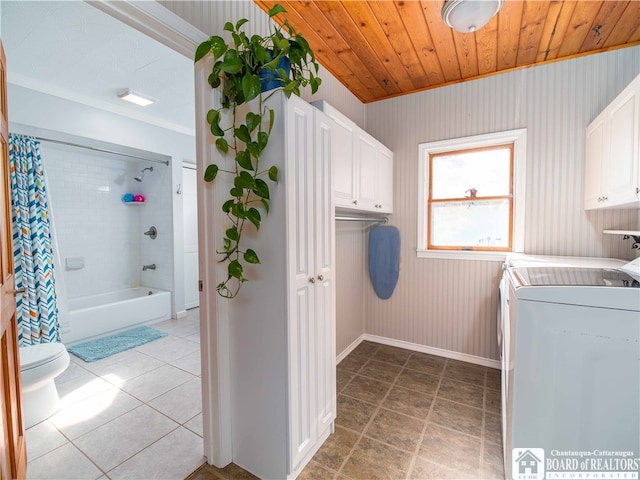 laundry room with crown molding, cabinets, washer and dryer, and wooden ceiling