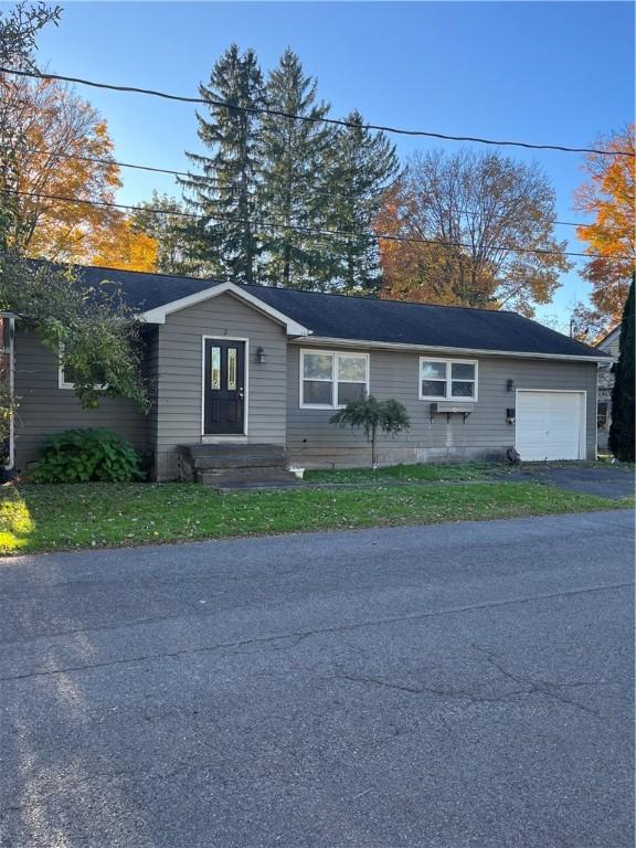 2 Patterson St, Sidney, NY 13838 - single story home featuring an attached garage and asphalt driveway