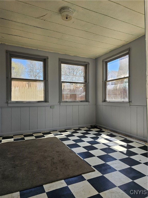 spare room featuring wood ceiling