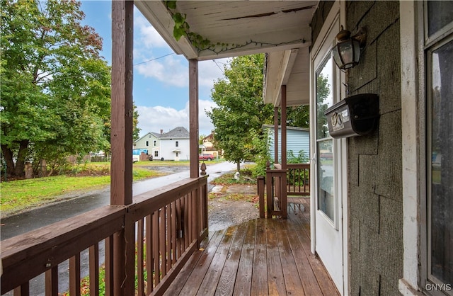 wooden deck featuring a porch