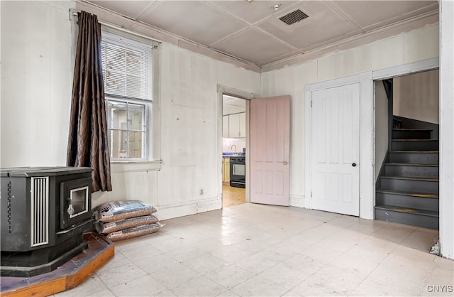 interior space featuring a wood stove