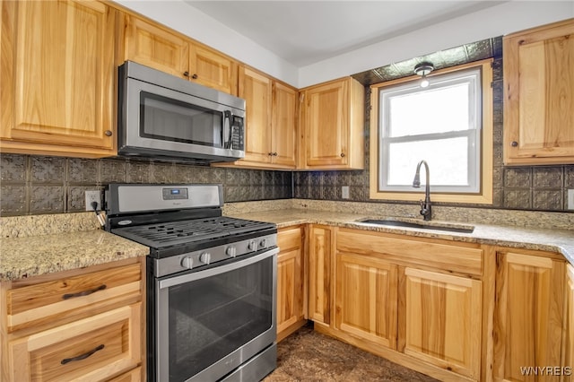 kitchen featuring sink and appliances with stainless steel finishes