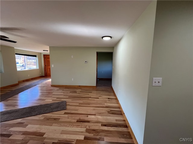 hallway with light wood-type flooring