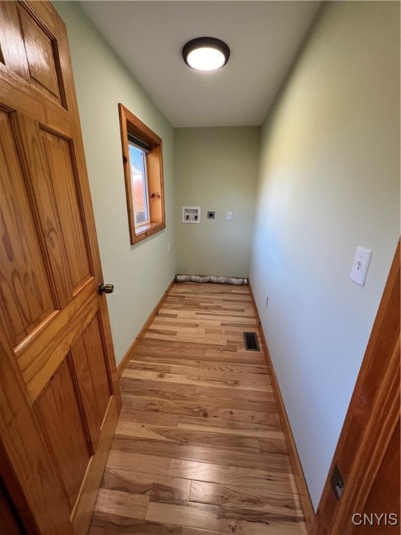 hall featuring light hardwood / wood-style floors