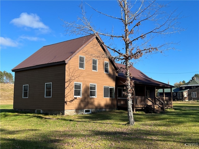 view of property exterior with a yard