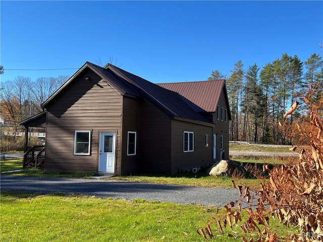 exterior space with a front yard