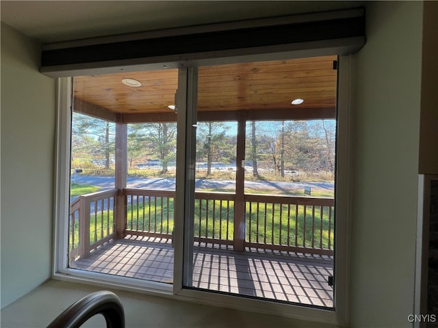 doorway featuring wood ceiling