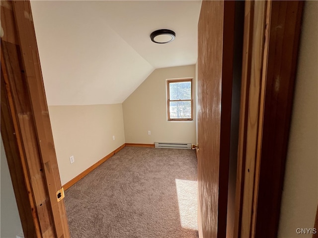 additional living space featuring carpet, lofted ceiling, and a baseboard radiator