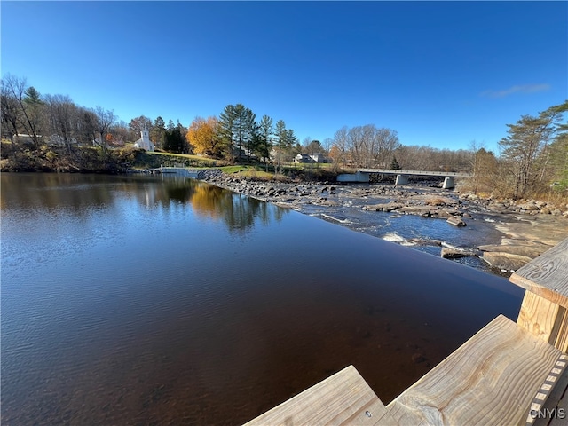 view of dock with a water view