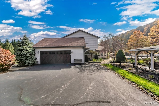 view of property exterior with a garage