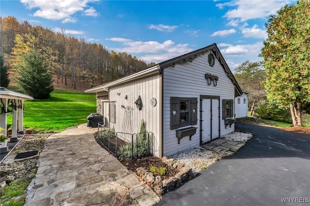 exterior space with a lawn