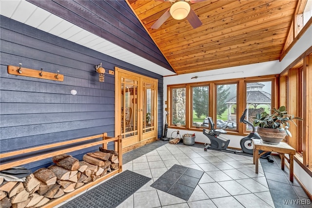 sunroom featuring ceiling fan, wooden ceiling, and lofted ceiling