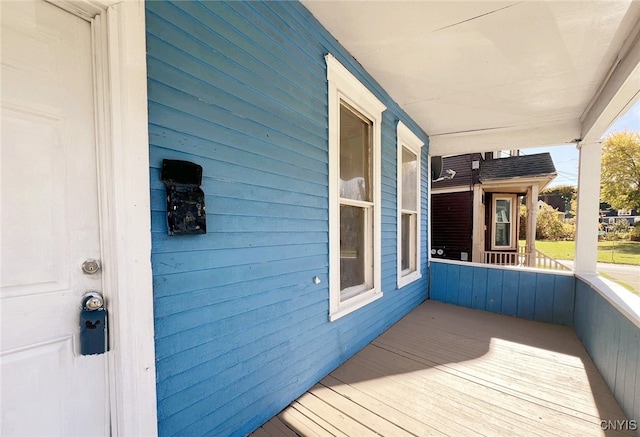 wooden deck featuring a porch