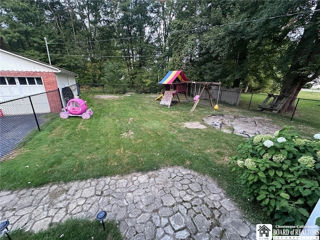 view of yard with a playground