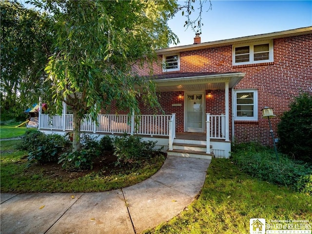 view of front of home featuring covered porch