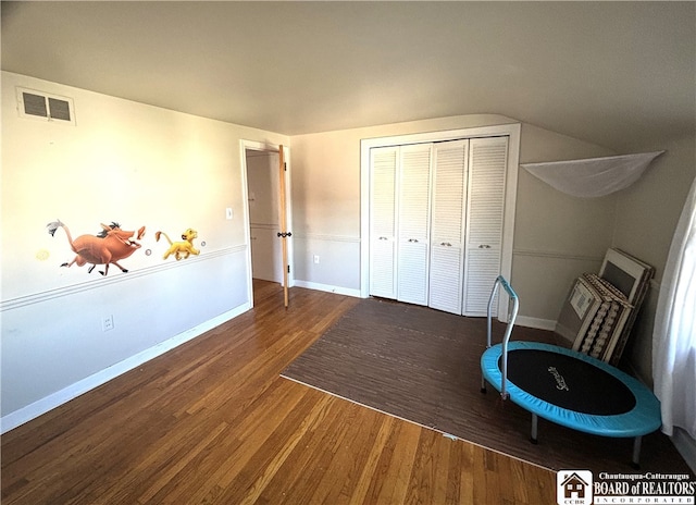 interior space with dark hardwood / wood-style floors