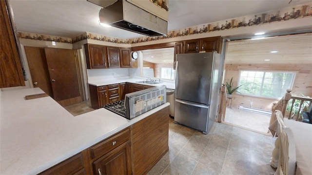 kitchen featuring a healthy amount of sunlight, appliances with stainless steel finishes, and sink